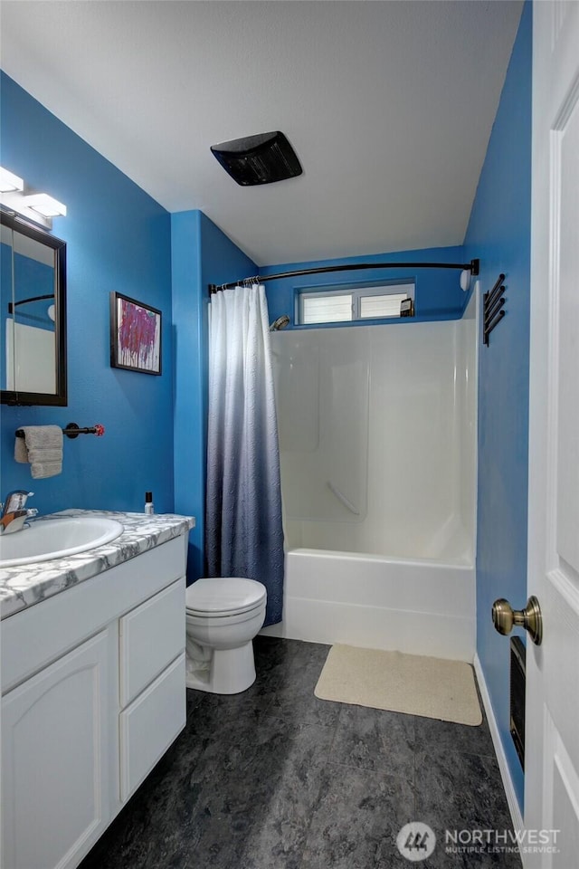 348 Cockle St SW, Ocean Shores, WA 98569 - bathroom featuring vanity, toilet, and shower / bathtub combination with curtain