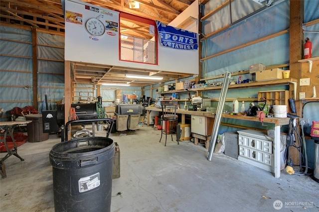 348 Cockle St SW, Ocean Shores, WA 98569 - garage with a workshop area