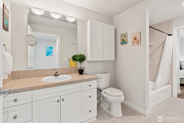 321 10th Ave S Unit 705, Seattle, WA 98104 - full bath with toilet, tile patterned floors, vanity, shower / tub combo with curtain, and baseboards