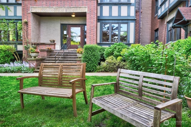 surrounding community featuring a lawn