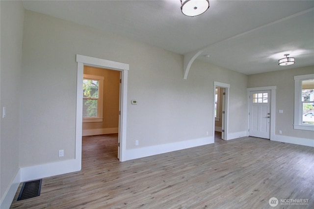1813 10th St, Anacortes, WA 98221 - entrance foyer featuring wood finished floors and baseboards