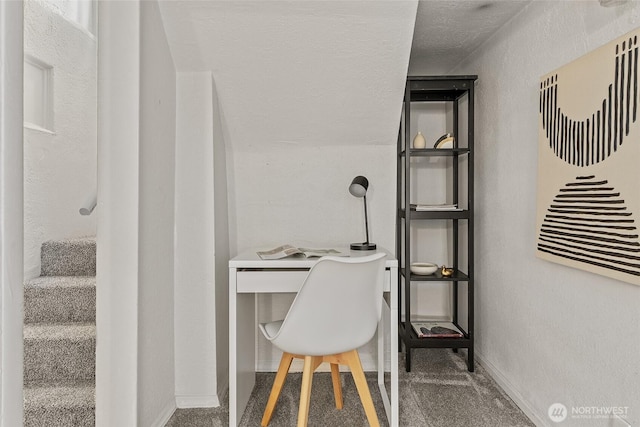 office space with baseboards