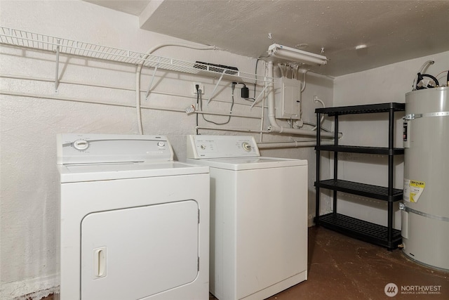 laundry area featuring secured water heater, washing machine and dryer, and electric panel