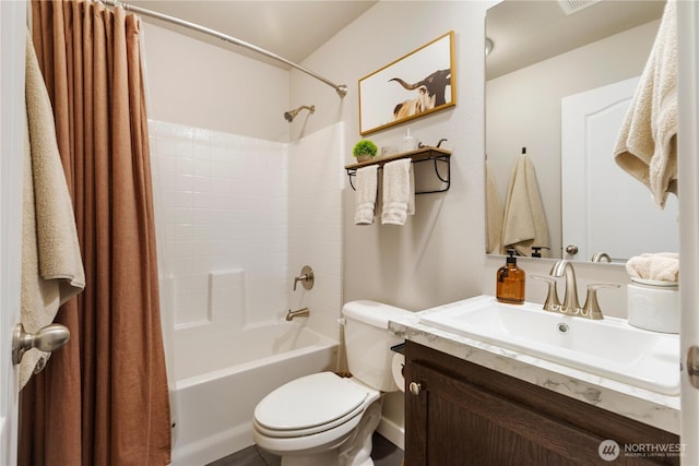 bathroom featuring toilet, shower / tub combo with curtain, and vanity