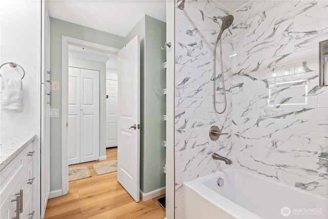 12515 109th Ct NE Unit B104, Kirkland, WA 98034 - full bathroom featuring  shower combination, vanity, and wood finished floors