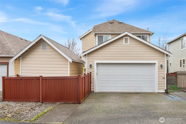 3516 Preston St NE, Lacey, WA 98516 - view of side of property with a garage, asphalt driveway, and a shingled roof