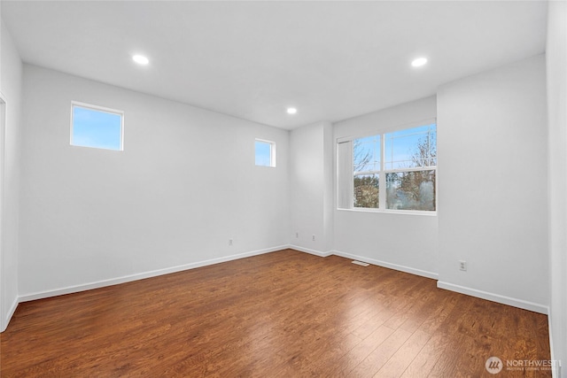 3516 Preston St NE, Lacey, WA 98516 - unfurnished room with wood finished floors, recessed lighting, and baseboards