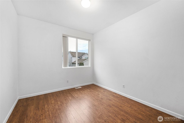 3516 Preston St NE, Lacey, WA 98516 - empty room featuring wood finished floors and baseboards