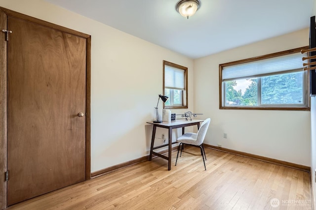 2523 Royal Ct E, Seattle, WA 98112 - office area featuring baseboards and light wood finished floors