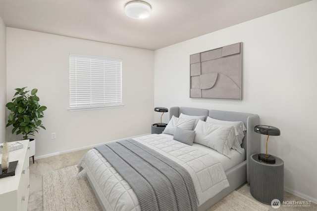 carpeted bedroom with baseboards