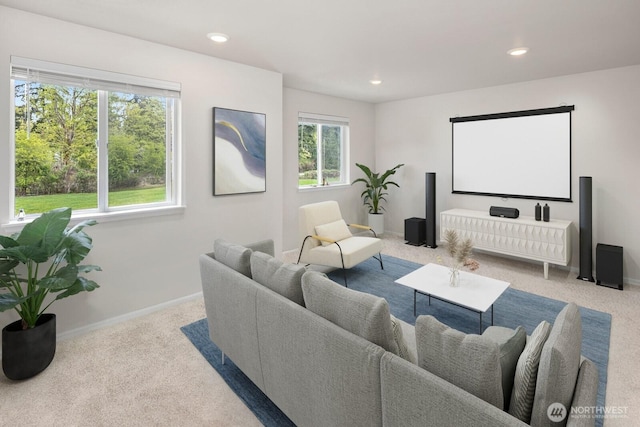 living room featuring carpet flooring and recessed lighting