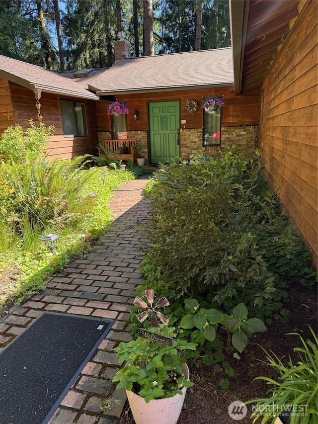 6221 Neylon Dr SW, Olympia, WA 98512 - property entrance with a chimney and brick siding