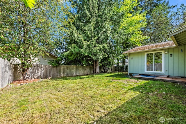 view of yard featuring a fenced backyard