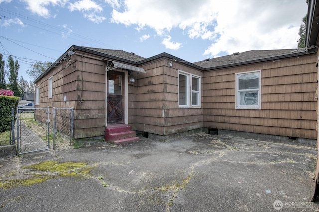 1306 Morgan St, Aberdeen, WA 98520 - view of home's exterior featuring a gate, fence, and entry steps
