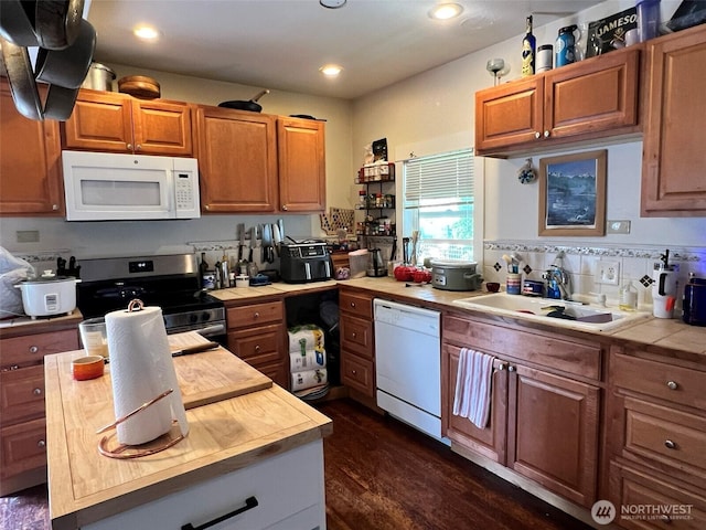2927 Orleans St, Bellingham, WA 98226 - kitchen featuring white appliances, a sink, tile countertops, dark wood finished floors, and recessed lighting