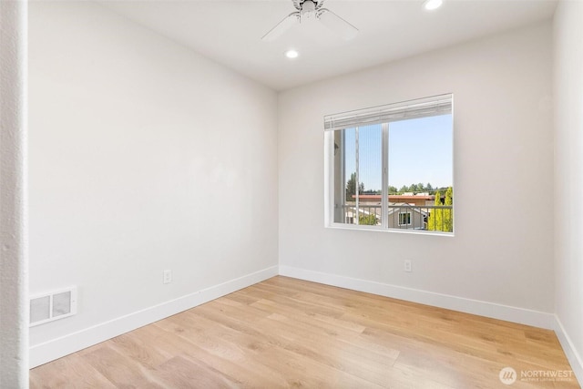 empty room featuring recessed lighting, baseboards, light wood-type flooring, and ceiling fan