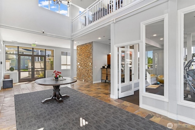 lobby featuring a high ceiling