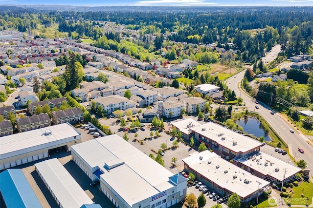 drone / aerial view of a heavily wooded area