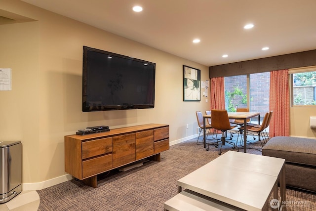 living room with recessed lighting, baseboards, and dark colored carpet