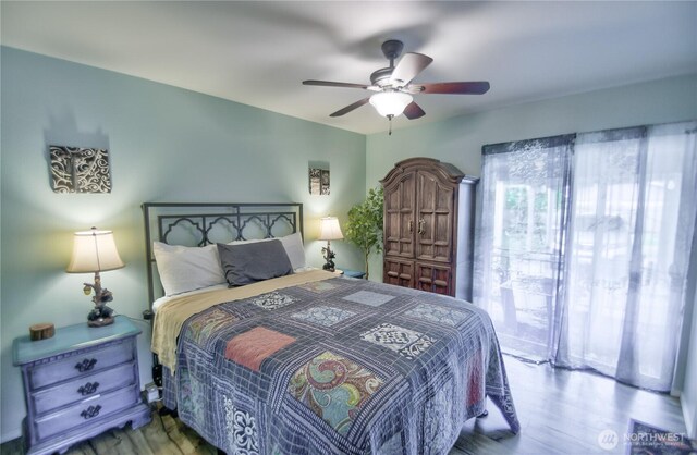 111 E Martin St, Elma, WA 98541 - bedroom featuring a ceiling fan and wood finished floors