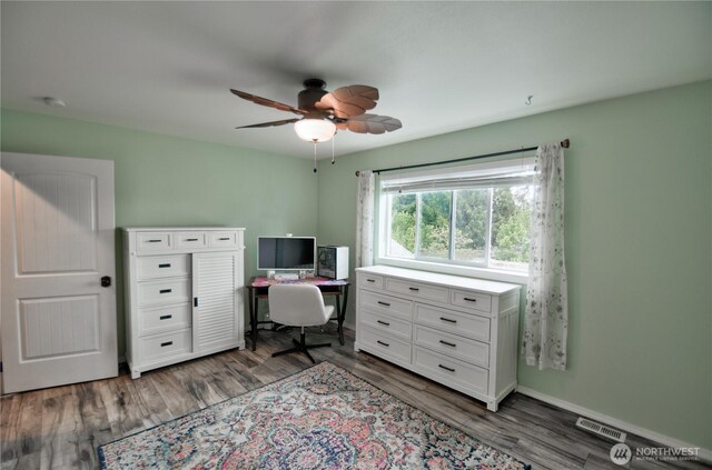 111 E Martin St, Elma, WA 98541 - office featuring visible vents, wood finished floors, baseboards, and ceiling fan