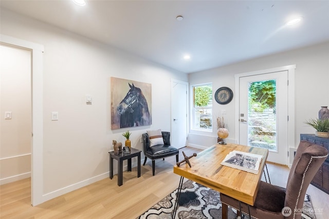 office space with light wood finished floors, baseboards, and recessed lighting