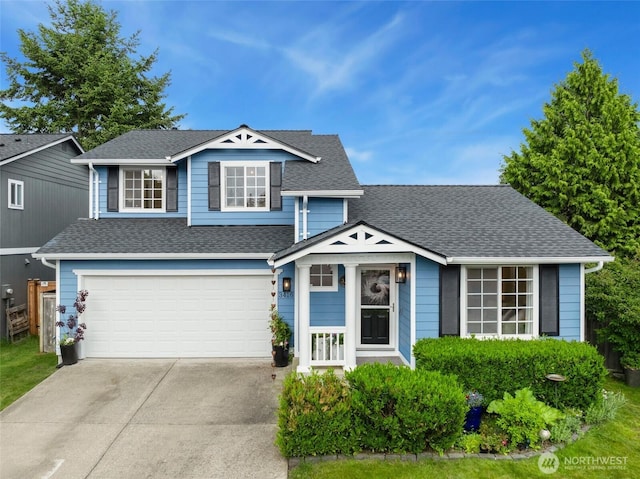 3416 189th St SE, Bothell, WA 98012 - view of front of house with driveway, a shingled roof, and a garage