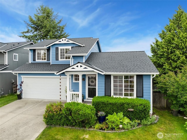 3416 189th St SE, Bothell, WA 98012 - view of front of house with driveway, roof with shingles, an attached garage, and fence