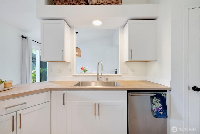 3416 189th St SE, Bothell, WA 98012 - kitchen with dishwasher, a sink, white cabinets, and wood counters
