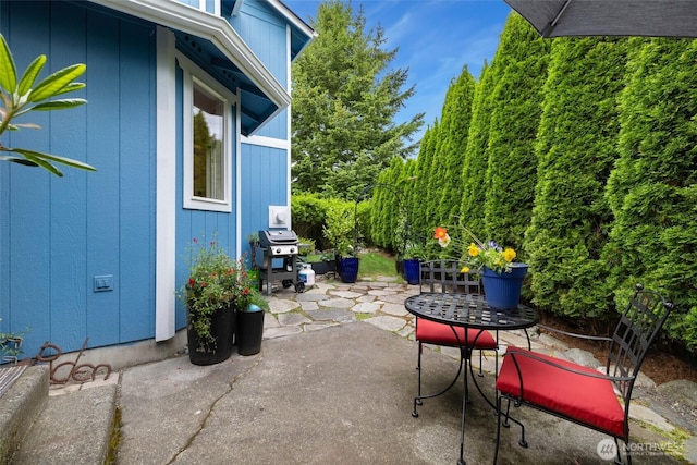 3416 189th St SE, Bothell, WA 98012 - view of patio / terrace with a grill and outdoor dining space