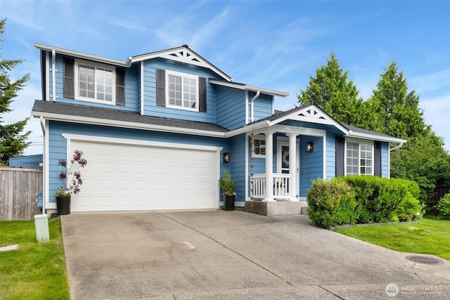 3416 189th St SE, Bothell, WA 98012 - view of front facade with covered porch, an attached garage, driveway, and fence