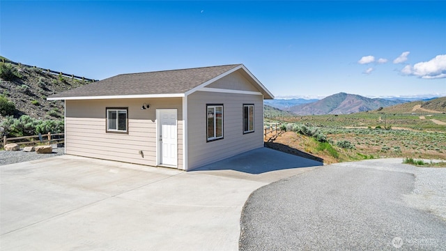 10 Spring Canyon Rd, Orondo, WA 98843 - view of front of property featuring a patio, a mountain view, and a shingled roof