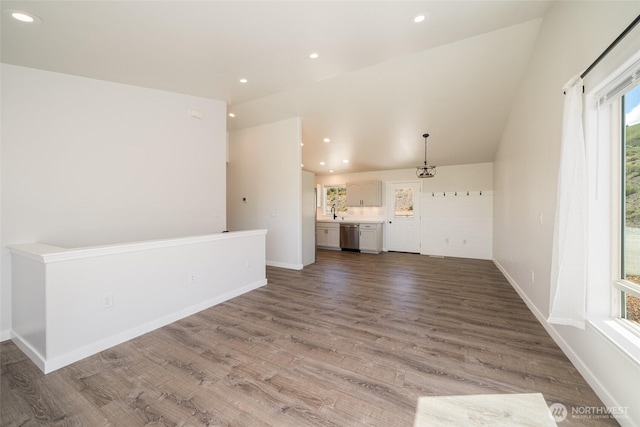 10 Spring Canyon Rd, Orondo, WA 98843 - unfurnished living room with wood finished floors, recessed lighting, baseboards, and lofted ceiling