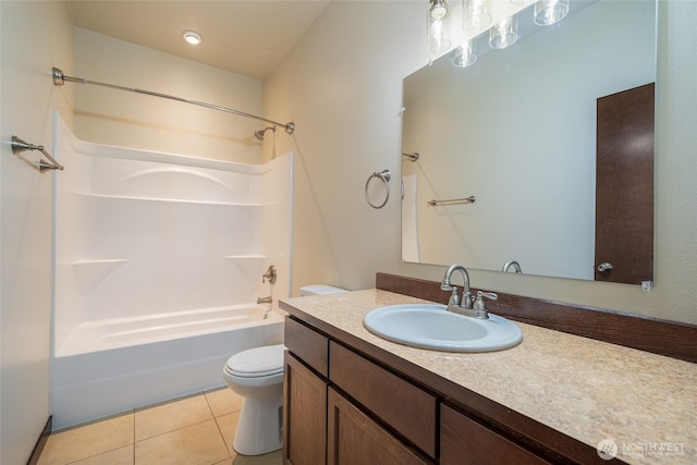 10 Spring Canyon Rd, Orondo, WA 98843 - bathroom featuring toilet, vanity, washtub / shower combination, and tile patterned flooring