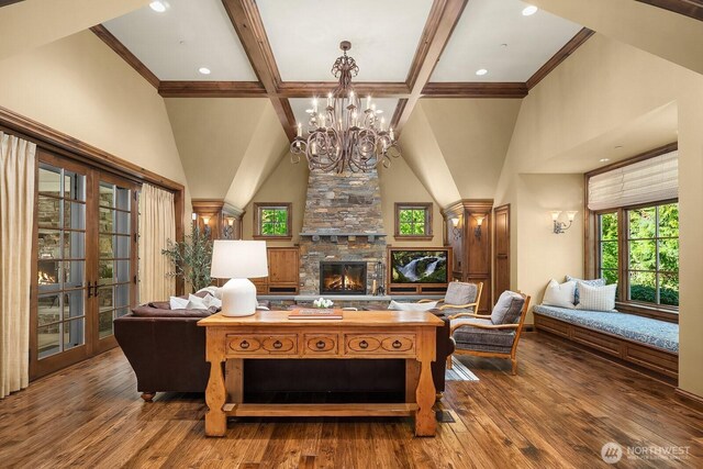 2045 250th Pl NE, Sammamish, WA 98074 - living room featuring a chandelier, a fireplace, hardwood / wood-style floors, beam ceiling, and crown molding
