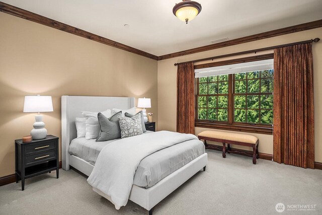 2045 250th Pl NE, Sammamish, WA 98074 - bedroom with light colored carpet, ornamental molding, and baseboards