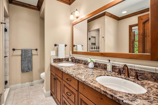 2045 250th Pl NE, Sammamish, WA 98074 - full bath featuring ornamental molding, a stall shower, toilet, baseboards, and tile patterned flooring