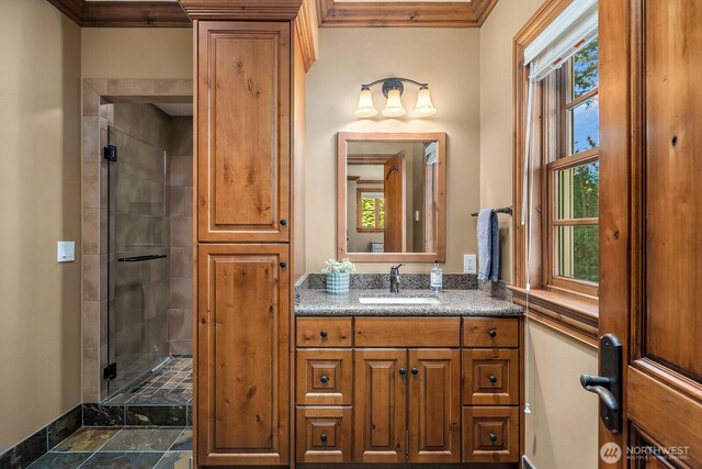 2045 250th Pl NE, Sammamish, WA 98074 - bathroom featuring a stall shower, crown molding, and vanity