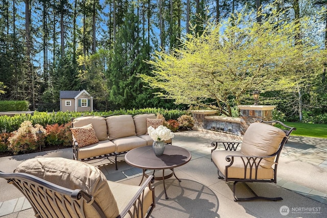 2045 250th Pl NE, Sammamish, WA 98074 - view of patio / terrace with an outdoor hangout area, an outbuilding, and a shed