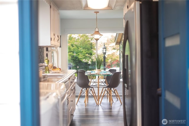 dining room with dark wood-style floors
