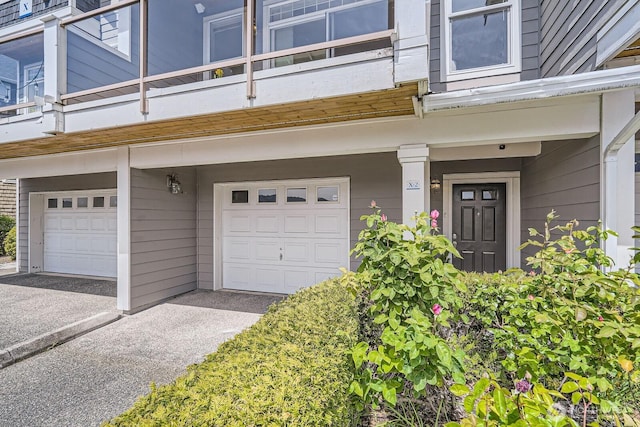 entrance to property with an attached garage