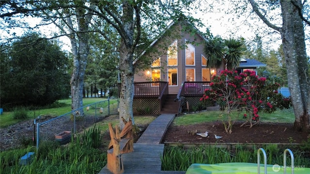 963 Hassalo Ave SE, Ocean Shores, WA 98569 - back of property with fence and a deck
