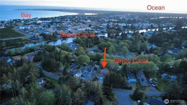 963 Hassalo Ave SE, Ocean Shores, WA 98569 - birds eye view of property featuring a water view and a residential view
