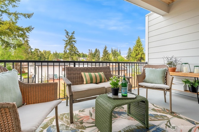 balcony with an outdoor hangout area