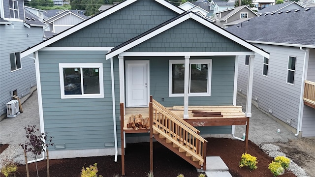 21 E Compass Ln, Allyn, WA 98524 - rear view of house with a porch