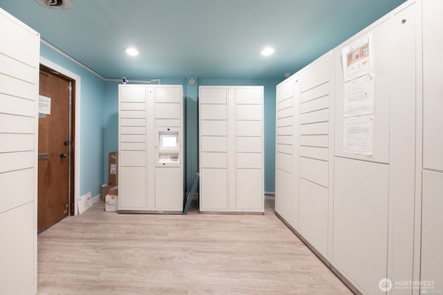 view of home's community with recessed lighting