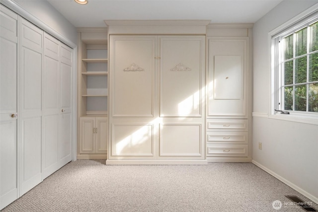 closet featuring visible vents