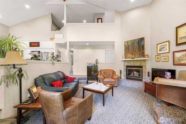 6874 Golf View Dr, Lynden, WA 98264 - living area with high vaulted ceiling, carpet flooring, a tile fireplace, and recessed lighting