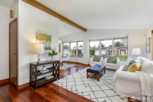 living room with hardwood / wood-style flooring and baseboards
