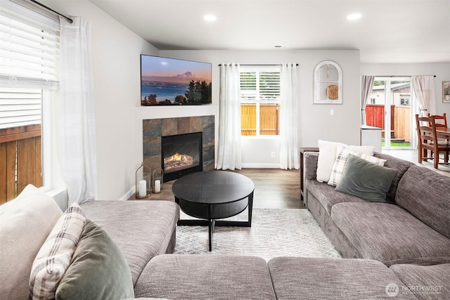 29058 215th Pl SE, Kent, WA 98042 - living area featuring wood finished floors, a fireplace, and recessed lighting